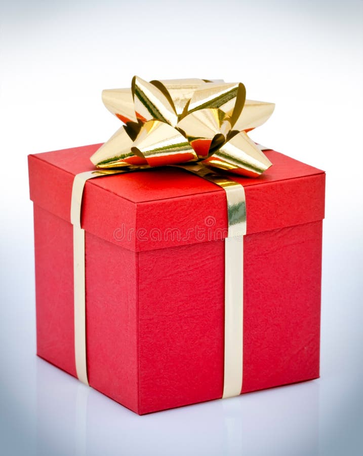 Red gift box with gold bow stock photo. Image of abstract 14175716
