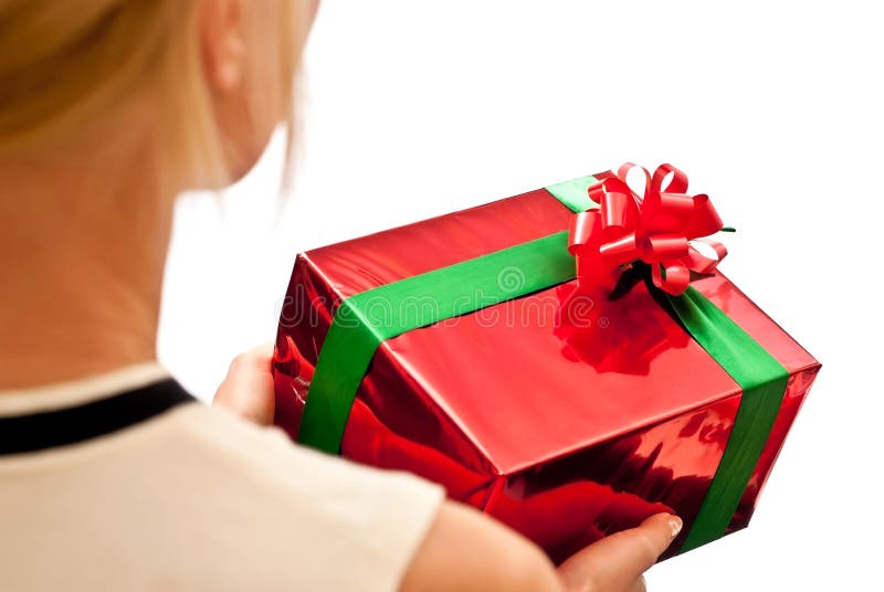 Red gift box in hands