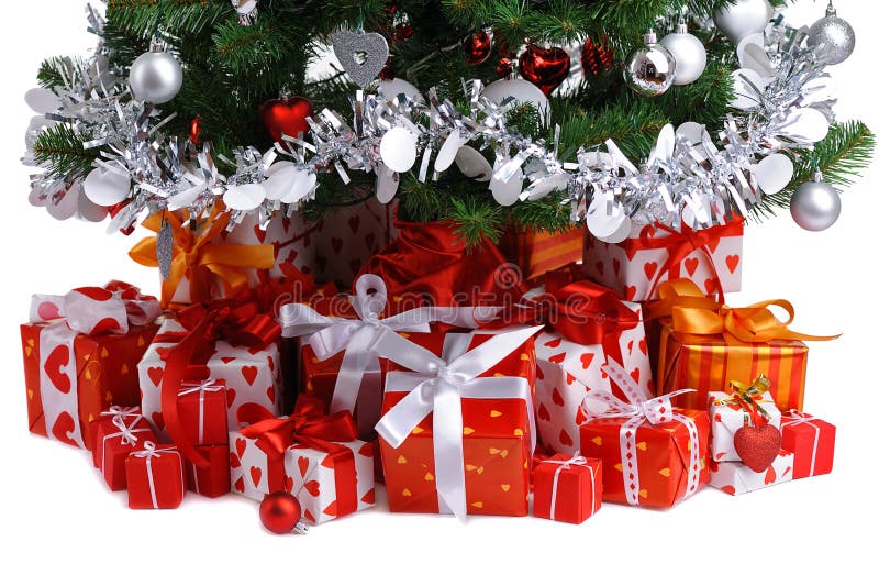 Red gift boxes under Christmas tree