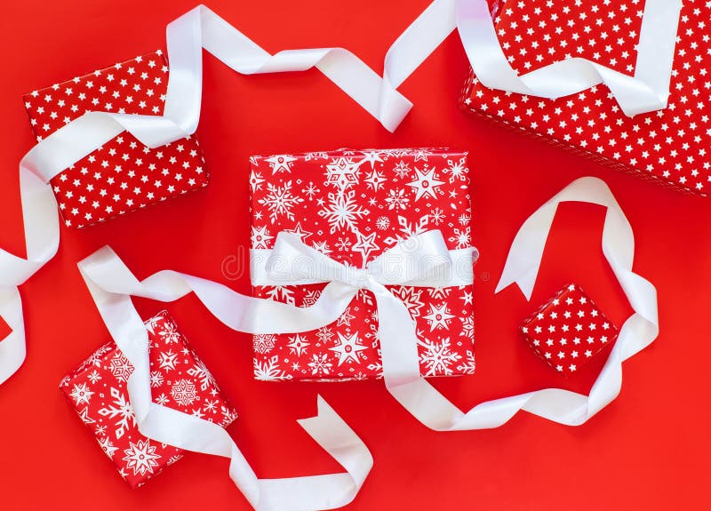 Red Gift Boxes with White Satin Ribbon on Red Stock Image Image of