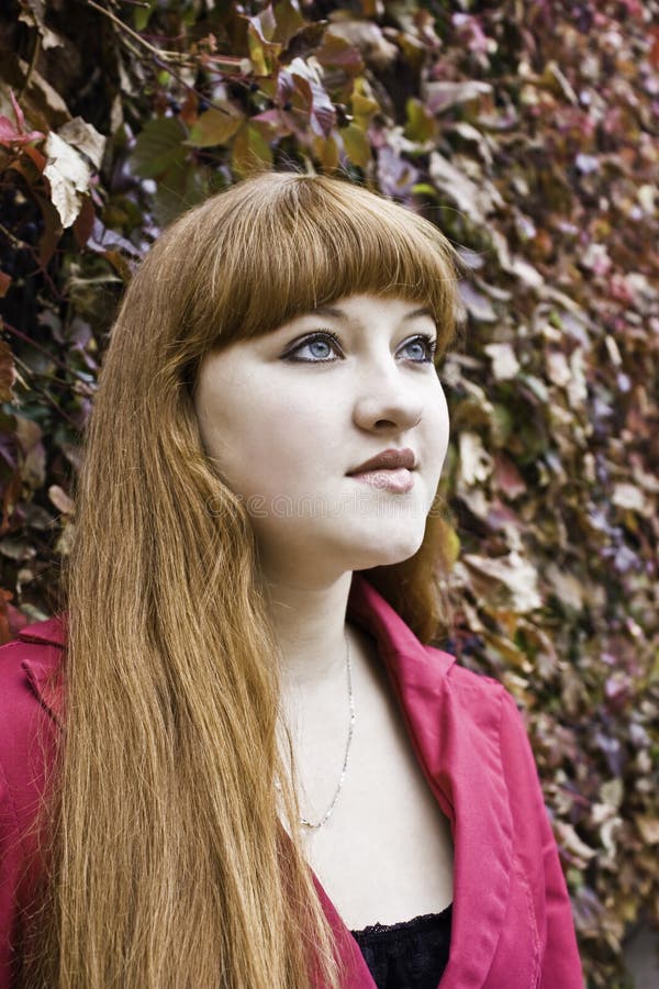 Red girl looking up forward stock photos Red girl looking up forward stock photos