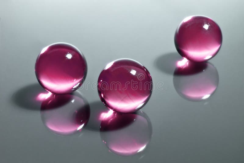 Red glass balls stock image. Image of transparent, three 15351465