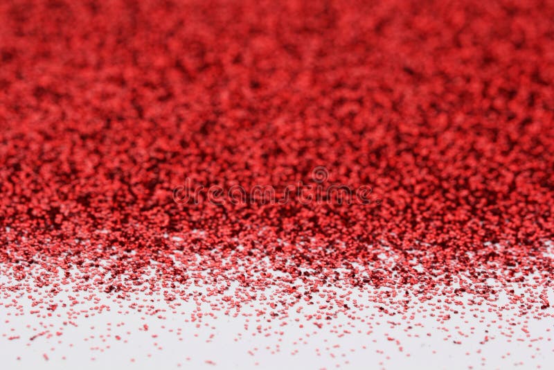 Glitter rosso sfondo astratto con sfondo sfocato.