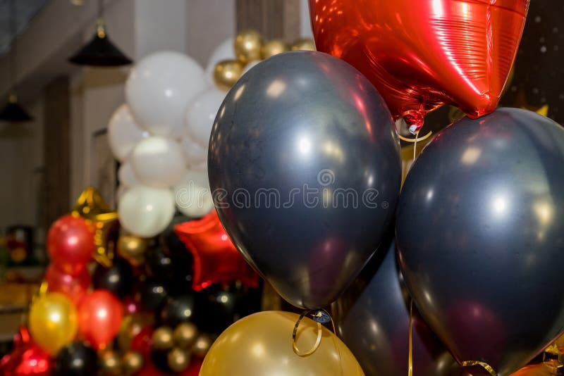 many balloons on wall colorful birthday decorations Stock Photo