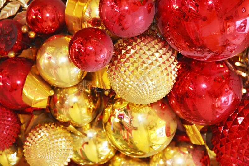 Red and gold shiny Christmas toys balls on the tree royalty free stock photography Red and gold shiny Christmas toys balls on the tree royalty free stock photography