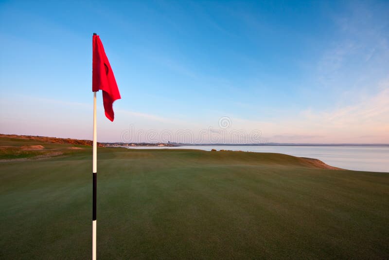 Red Golf Flag On A Green At Dawn Stock Photo Image of course, grass