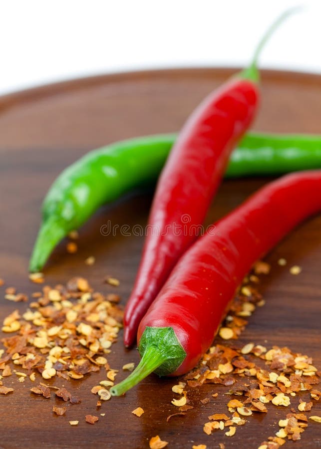 Red and green chili pepper stock photo. Image of board 15930964