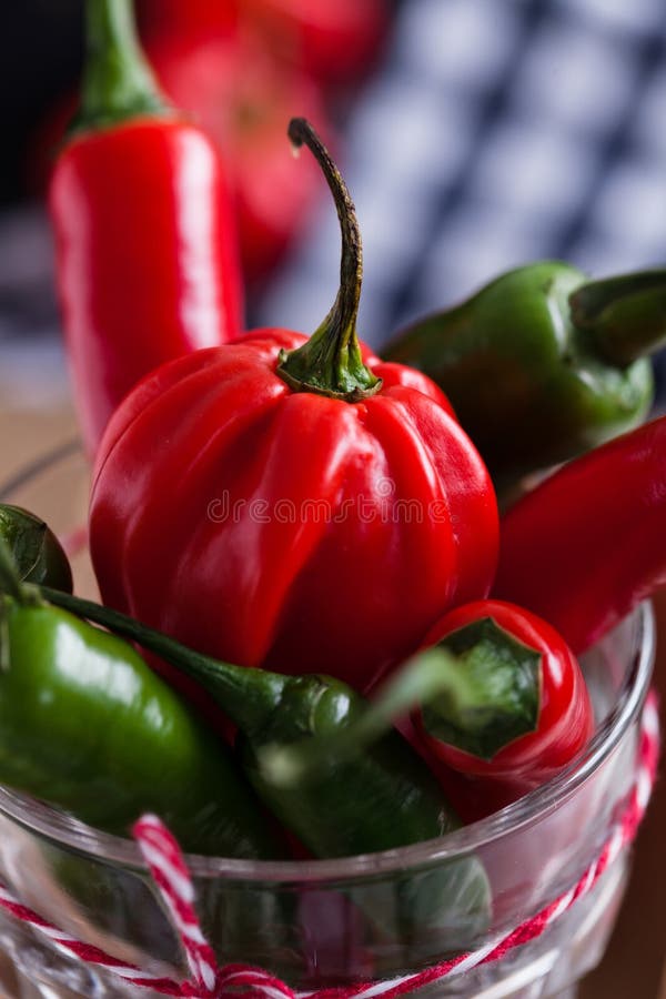 Red and Green Chili Peppers in Glass Stock Photo Image of peppers