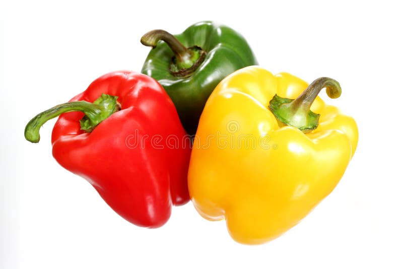 Red, green and yellow pepper closeup, isolated