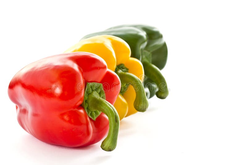 Red, green and yellow peppers