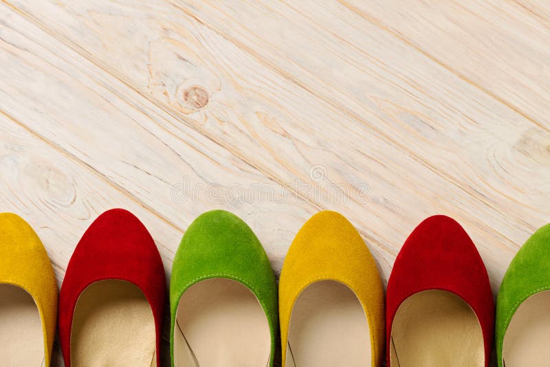 Red, Green and Yellow Women`s Shoes Ballerinas on Wooden Backg Stock ...