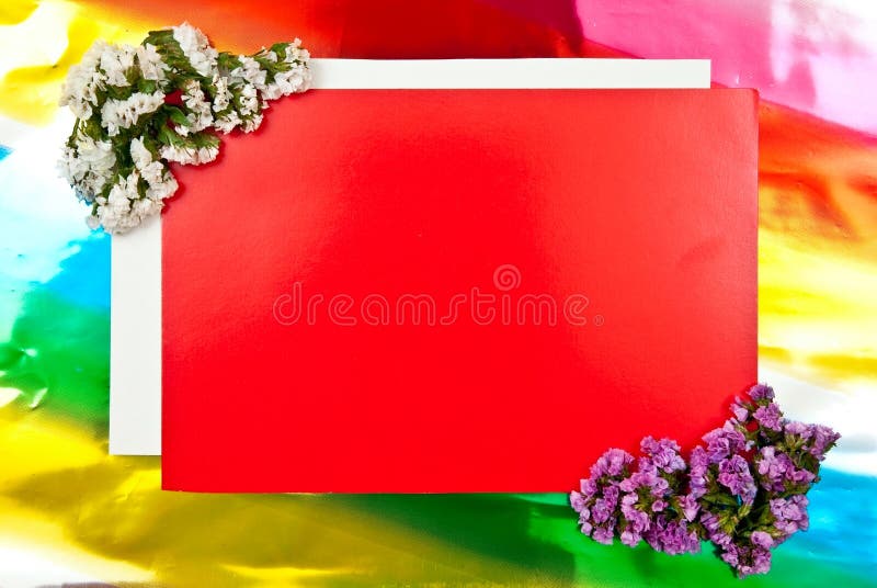 Red greeting card with flowers