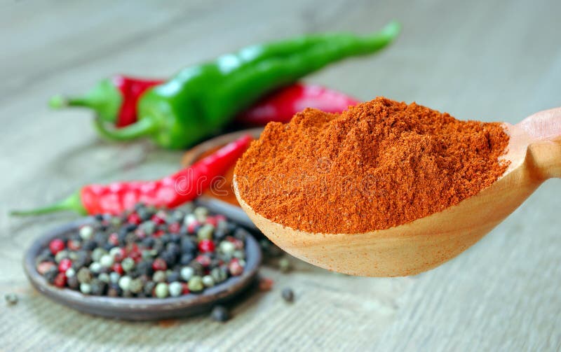 Red Ground Pepper and a Mixture of Peppers. Close Up. Stock Photo