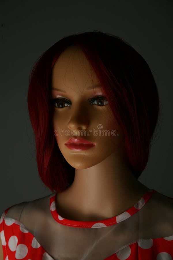 Red Haired Mannequin in a Polkadot Dress Stock Photo Image of white