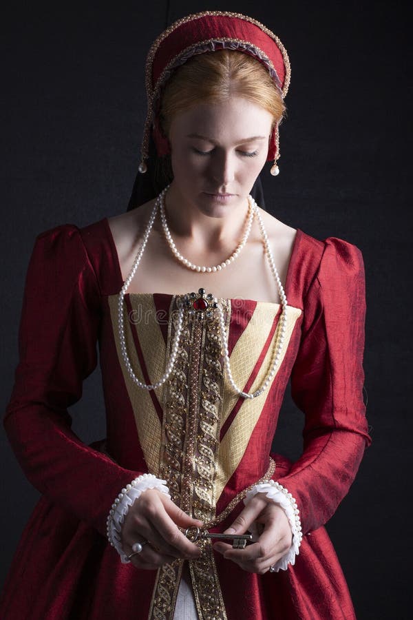 Red-haired Tudor Woman in Red Dress Stock Photo - Image of gown ...