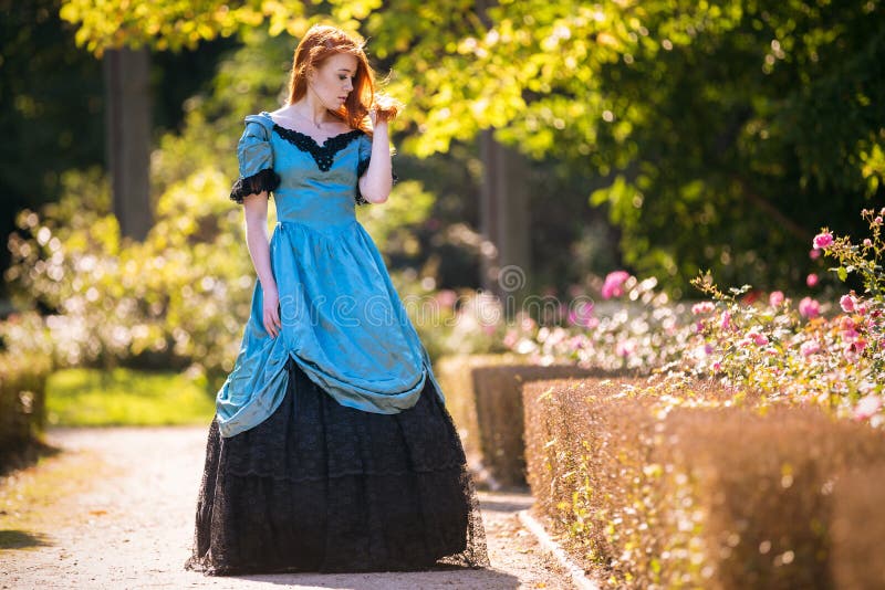 Red-haired woman in Victorian dress