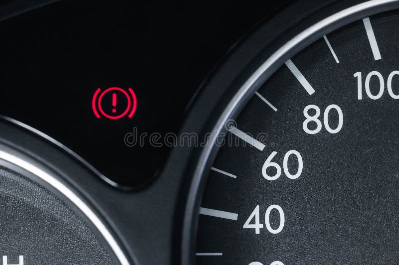 Handbrake Icon on the Dashboard. Modern Light Car Mileage. Stock Photo