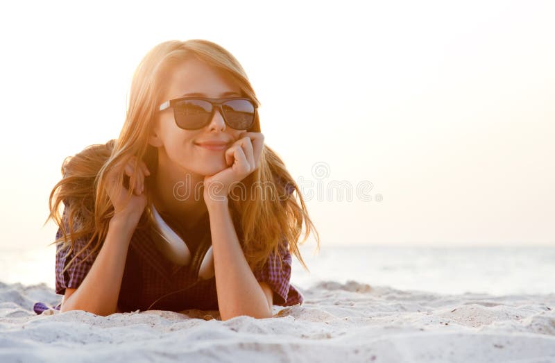 Red-head girl with headphones