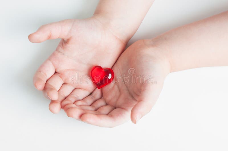 Red heart in baby s hands stock photo. Image of mother 65792348