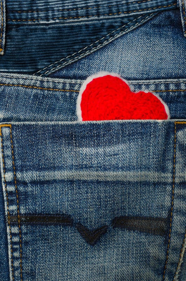 Red heart in jean pocket stock photo. Image of detail - 84120174