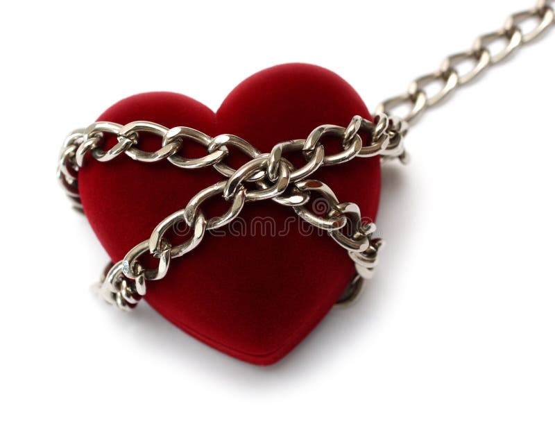 Red heart locked with chain. Isolated on white royalty free stock photos