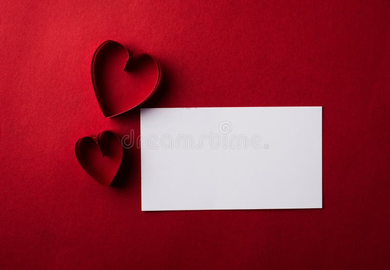 Red Heart paper and blank with note card on Red background