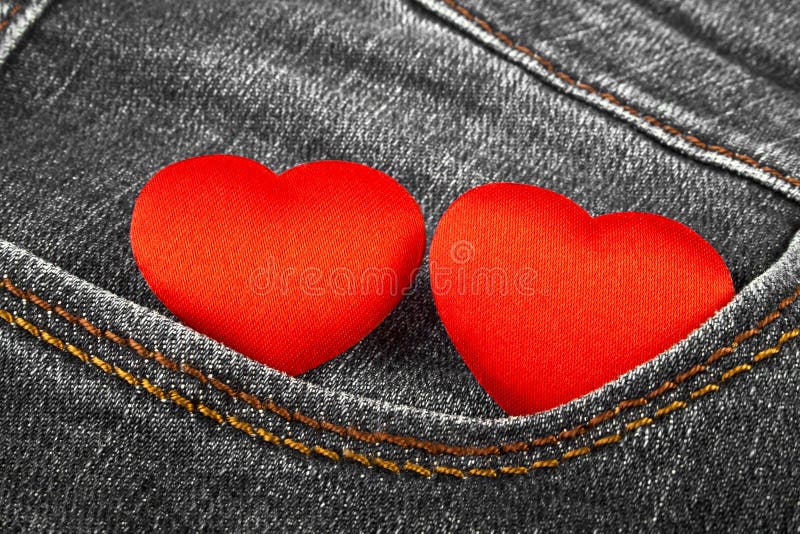 Red hearts in jeans pocket stock image. Image of garbage 171237705
