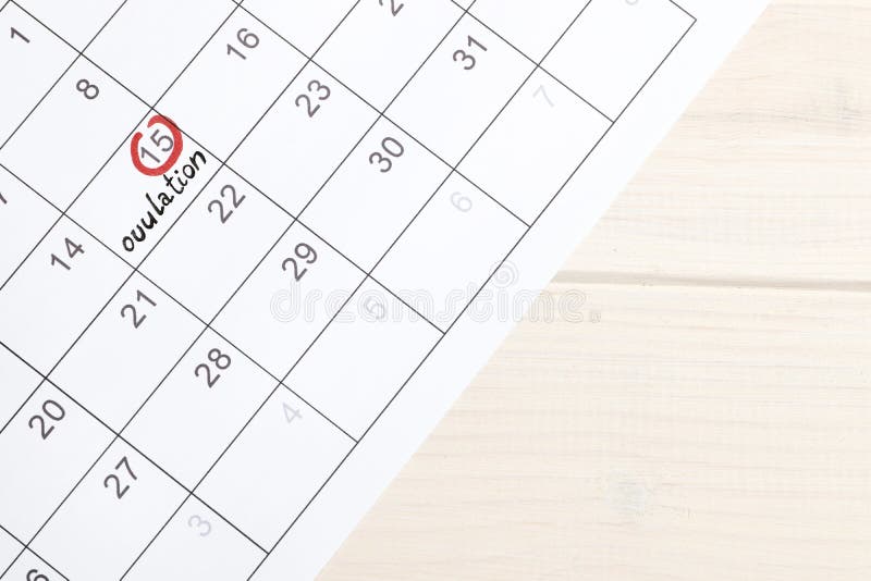 Red Highlighter With Ovulation Day Mark On Calendar Stock Photo Red Highlighter With Ovulation Day Mark On Calendar Stock Photo