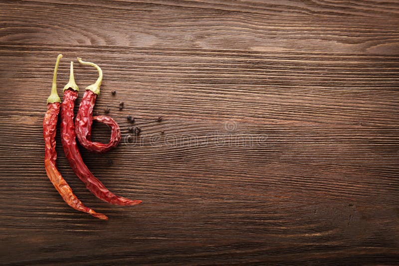 Red hot chili pepper on wood