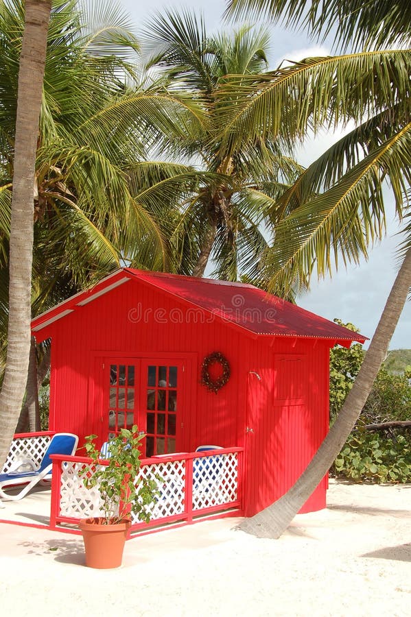 Red house on a tropical beach