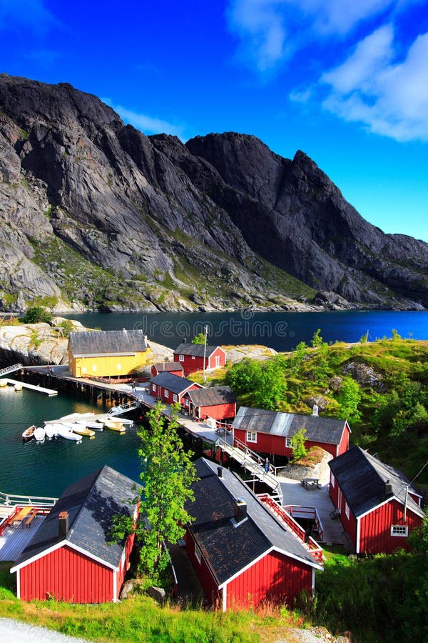 Red houses, cliffs and sea