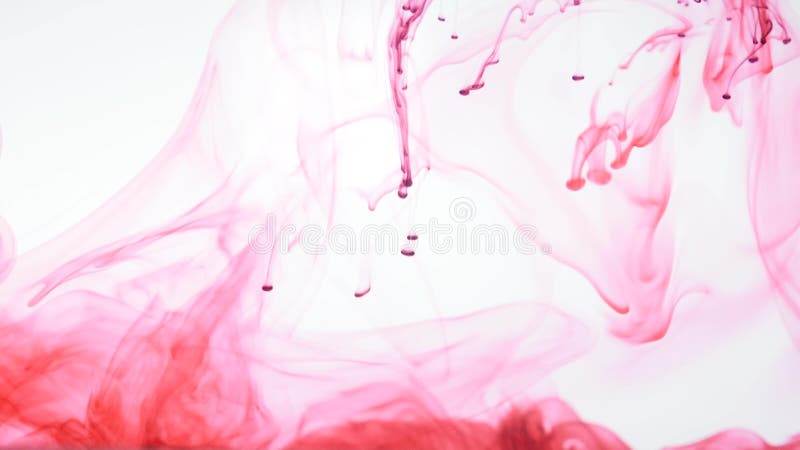 Red ink in water. Abstract