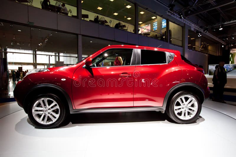 Red jeep car Nissan Juke