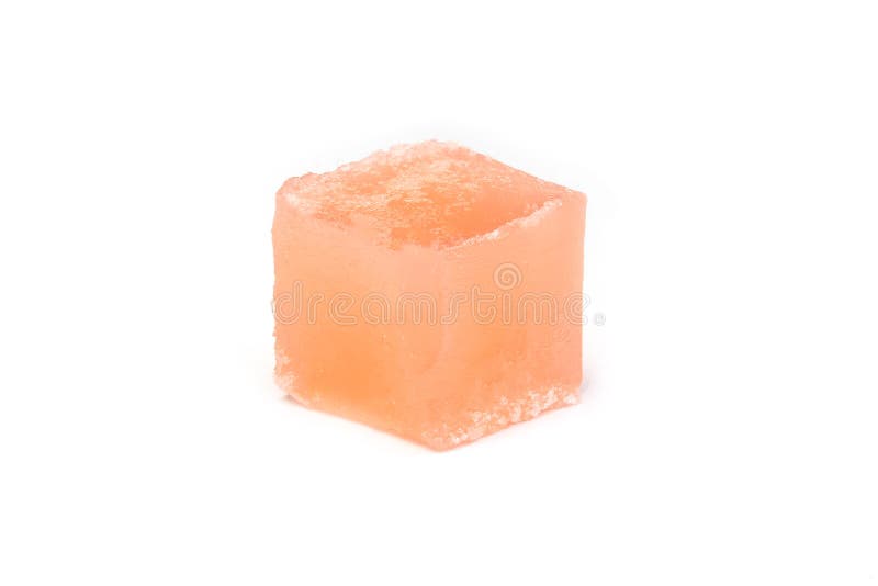 Red jelly cube isolated on white background. Gelatin square food snack