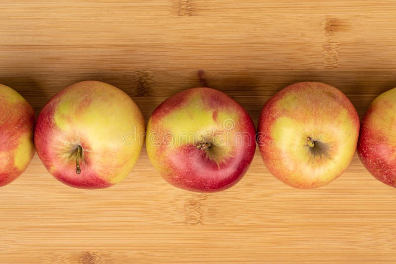 Red Jonagold Apple on Light Wood Stock Photo Image of close, flatlay