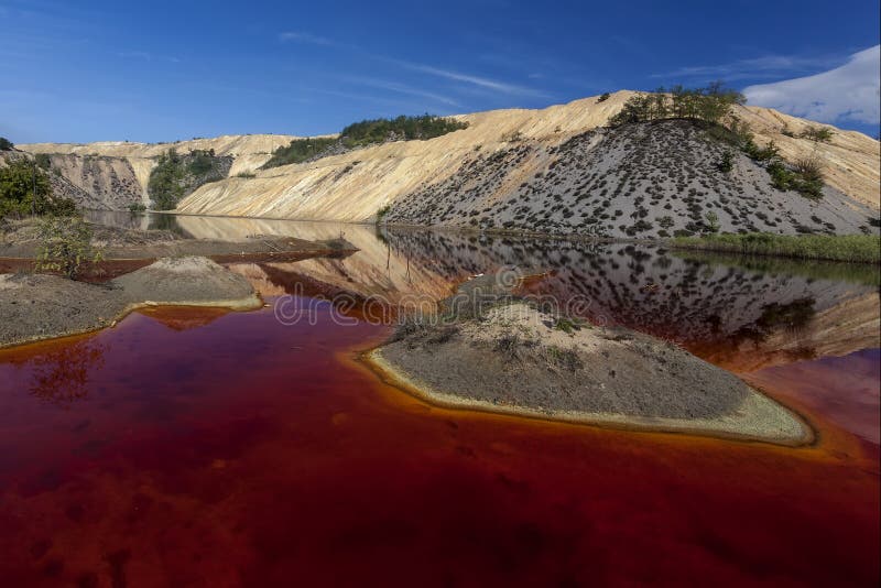 Red lake stock image. Image of mining, lake, holding - 61392373