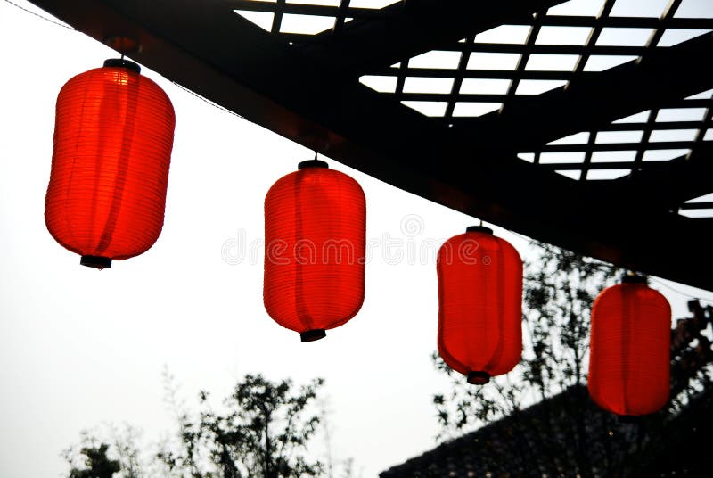 Red lantern under sun