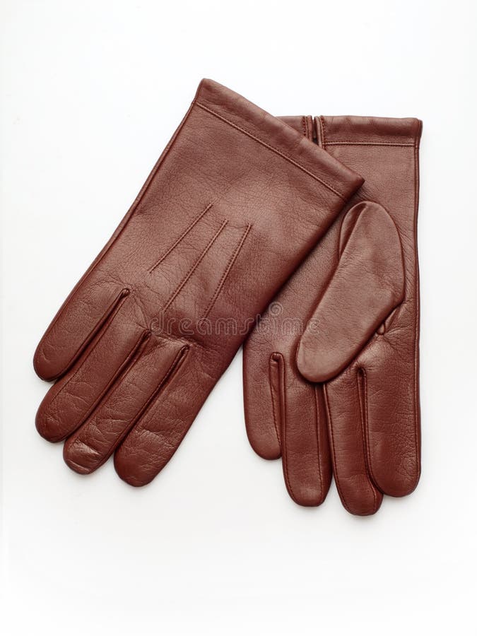 The pair of red leather gloves over white background. Button clasp stock images, royalty-free photos and pictures