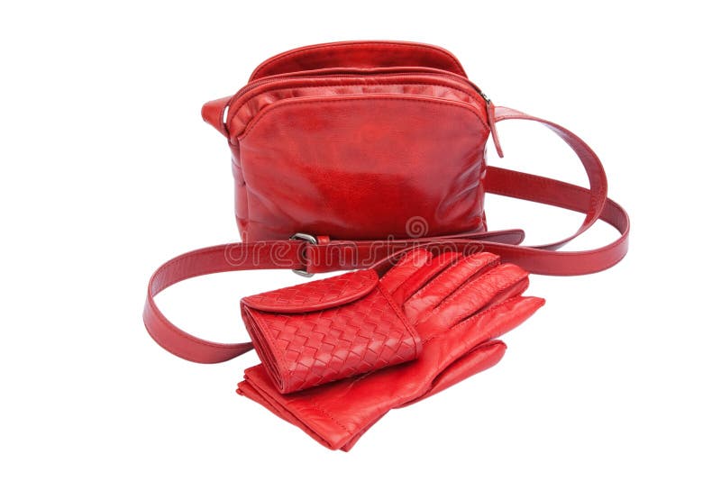 Red leather lady bag, gloves and purse isolated on white with clipping path