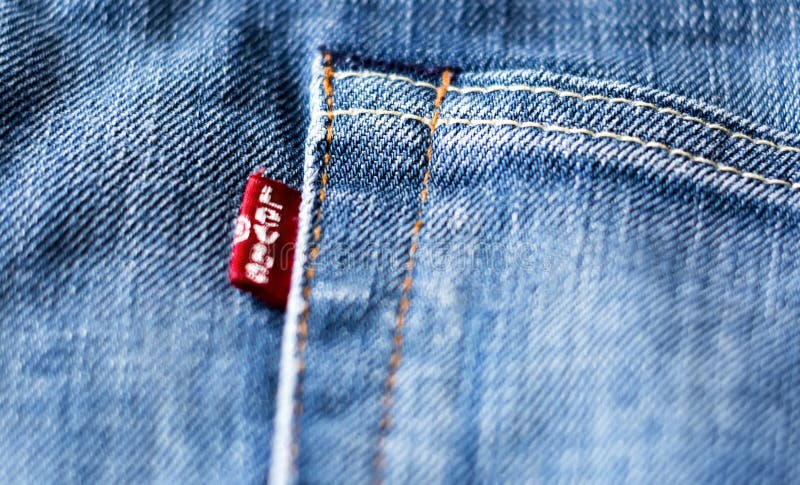 The Red Levi`s Label on the Back Pocket of a Pair of Jeans Editorial ...