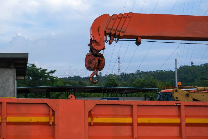 Red Lifting Crane Hook with Tower on Mobile Crane in Construction Site