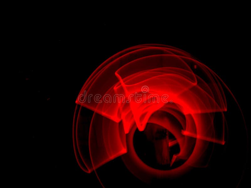 Red light painting, long exposure photography, ripples and round pattern stock images