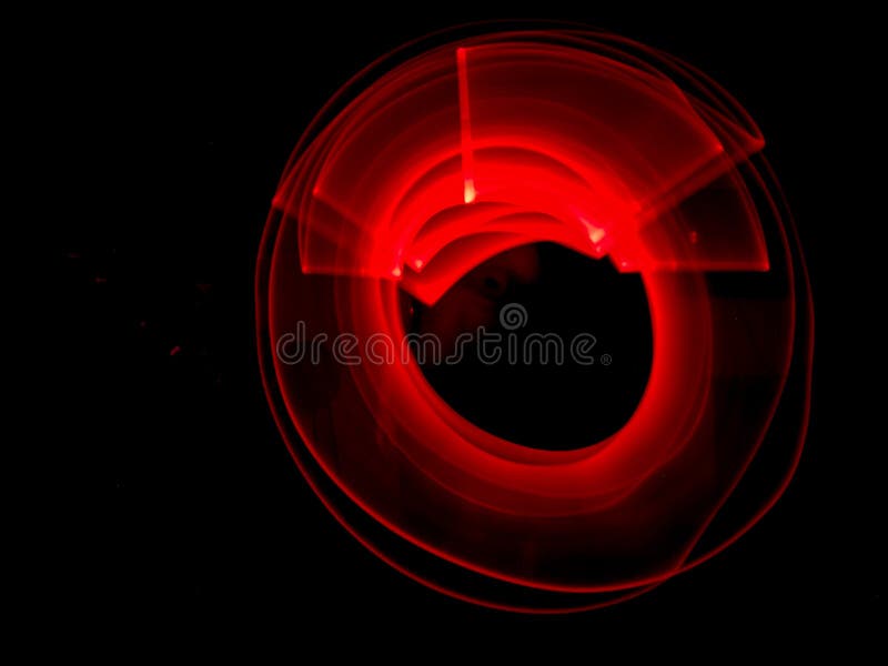 Red light painting, long exposure photography, ripples and round pattern royalty free stock photography