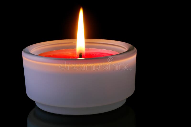 Red lighted candle stock photography
