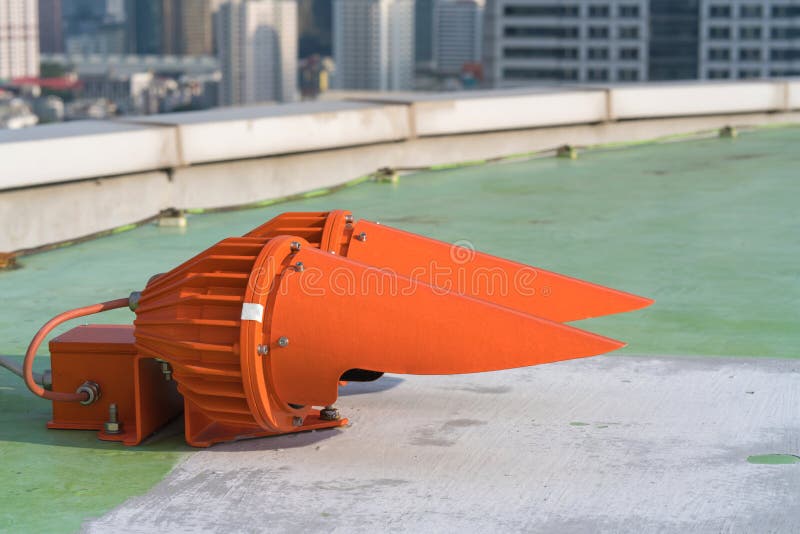 Red Lights on Top of Tower Building for Warning Air Plane Stock Photo