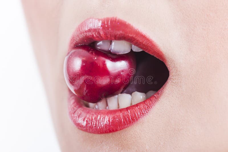 Lips with cherry stock photography