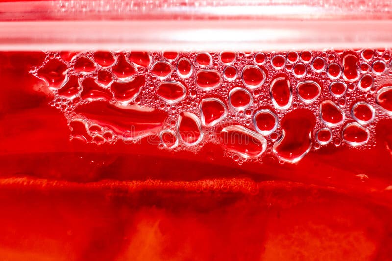 Red Liquid with Bubbles Closeup Stock Photo - Image of vibrant, white ...