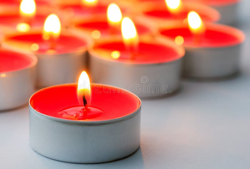 Red lit tea lights stock image. Image of peace, candlelight - 35425129