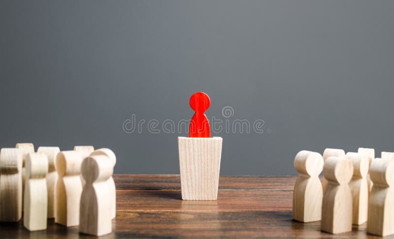 The red man gives a speech to the listening audience. Cooperation and collaboration. Leader and leadership skills, management. An idol to follow. Fundraising and gather people around the idea