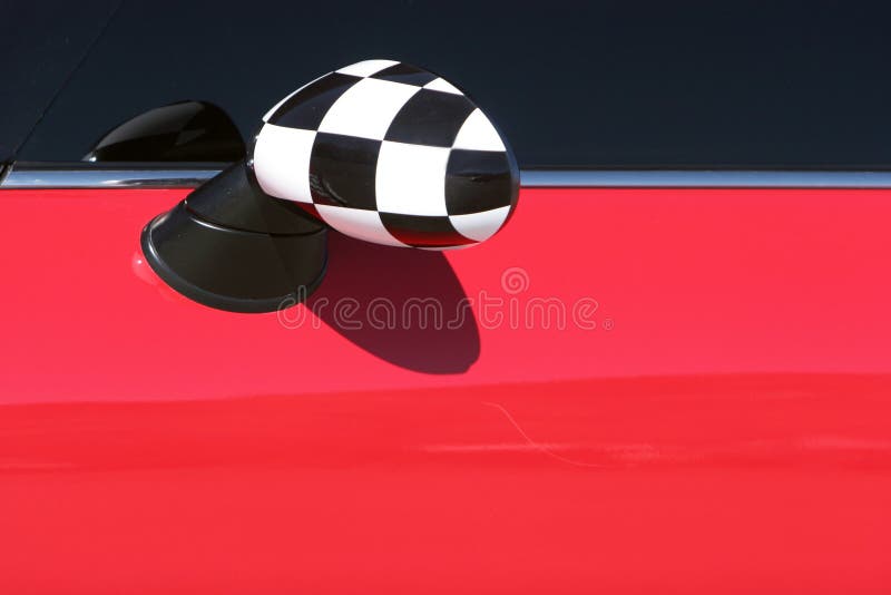 Red Mini Cooper sideview mirror